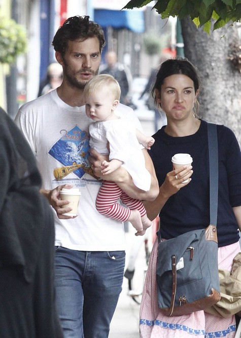 51507085 Northern Irish actor Jamie Dornan, who plays Christian Grey in the highly anticipated film 'Fifty Shades Of Grey' movie, is spotted at Queens Park with his wife, Amelia Warner and their young daughter on August 20, 2014 in London, UK. Jamie is enjoying all the family time he can before the 'Fifty Shades Of Grey' film is released on Valentines Day next year. FameFlynet, Inc - Beverly Hills, CA, USA - +1 (818) 307-4813 RESTRICTIONS APPLY: USA ONLY